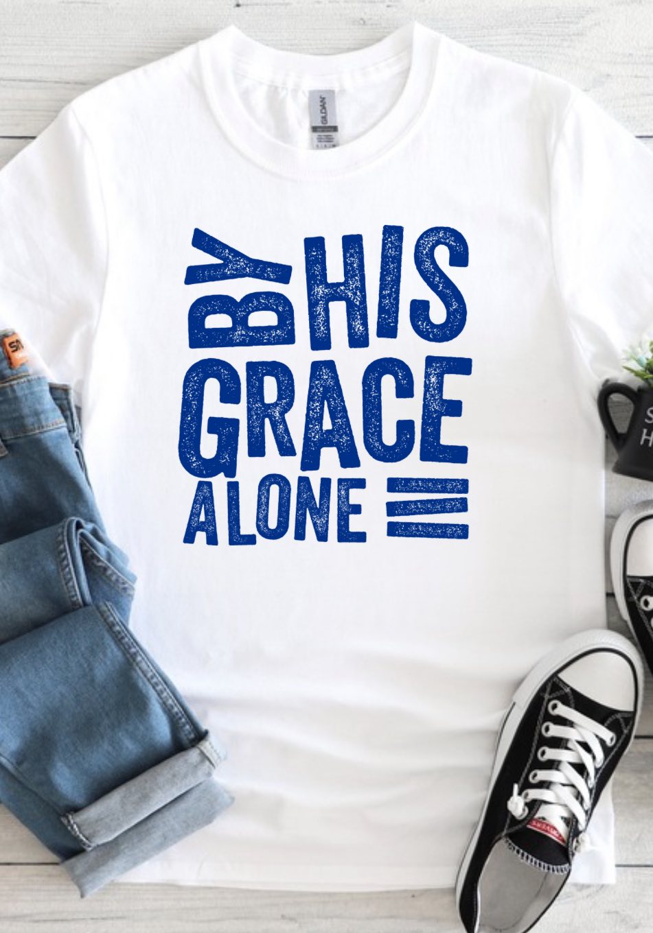 BY HIS GRACE ALONE